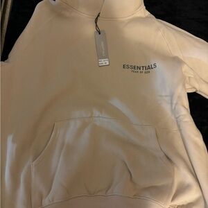 Cream essentials fear of god hoodie